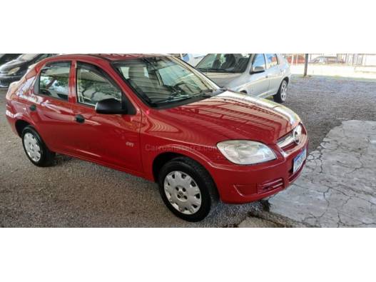 CHEVROLET - PRISMA - 2008/2009 - Vermelha - R$ 22.800,00